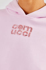 Boxy-Hoodie mit Glitzerapplikation - Pink