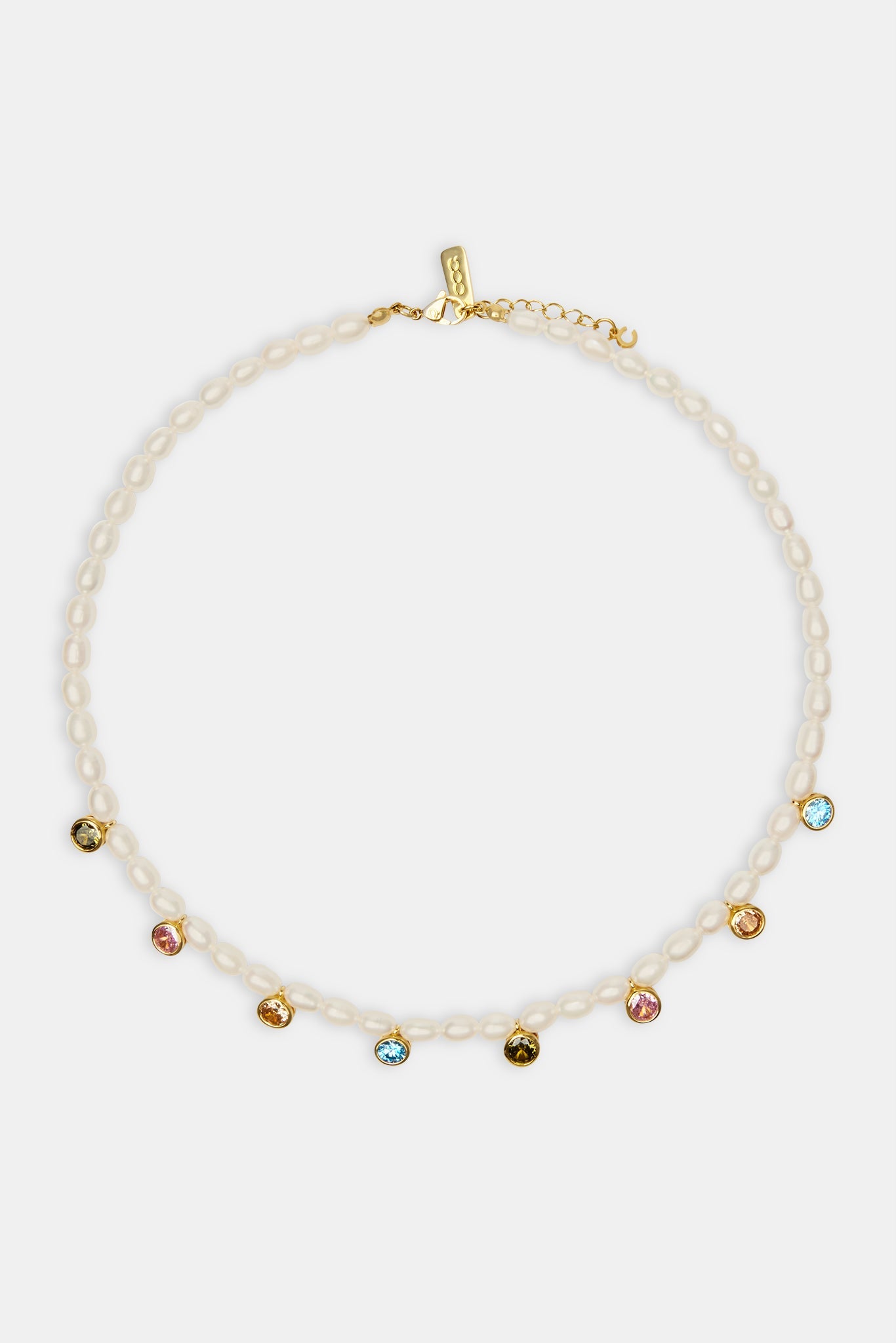 Freshwater pearl drop gem necklace on white background